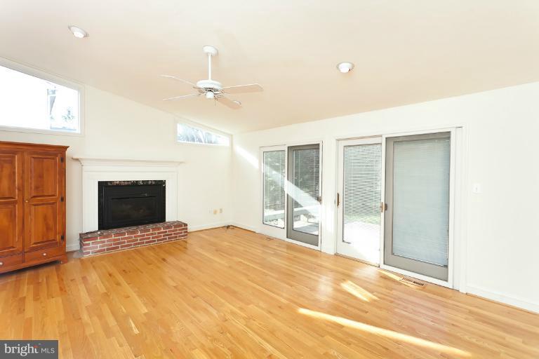 7916 Ruxway Road Towson, MD 21204 - Photo 4 of 20 Family Roomw/ gas fireplace & access to deck