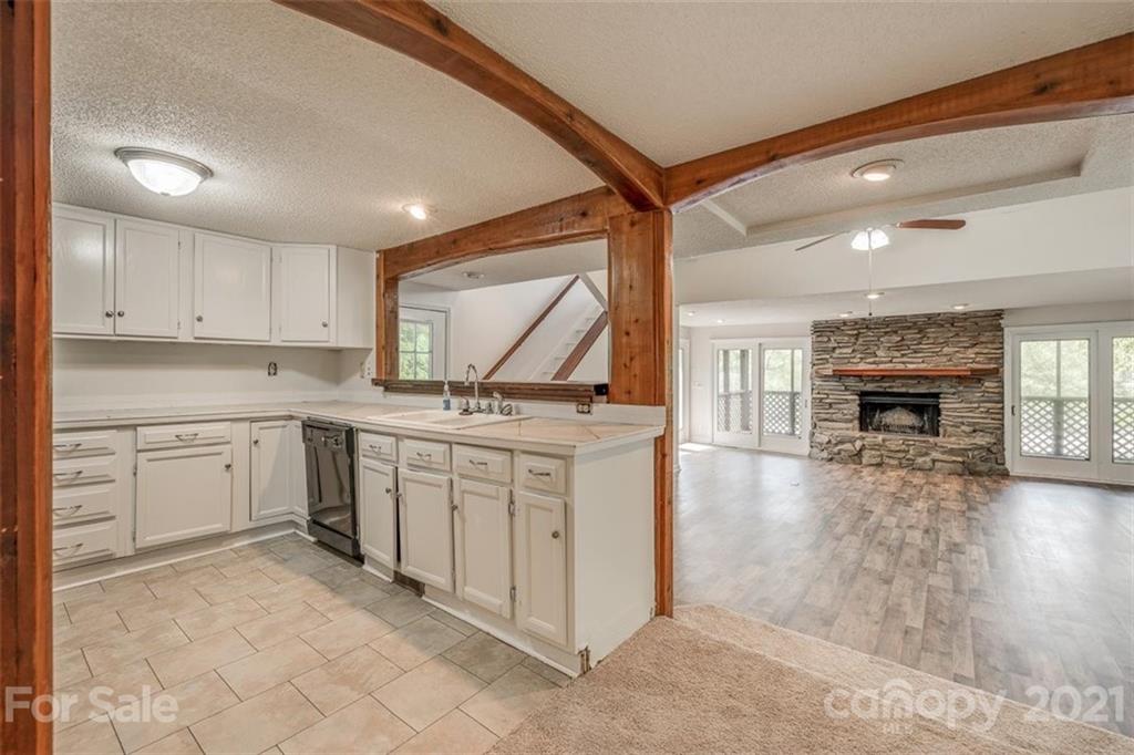5349 Charlotte Highway Lake Wylie, SC 29710 - Photo 16 of 35 a kitchen with sink cabinets and wooden floor