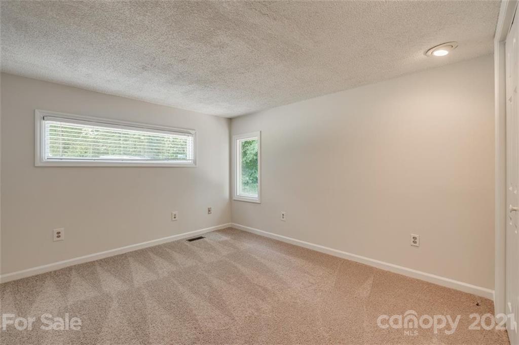 5349 Charlotte Highway Lake Wylie, SC 29710 - Photo 17 of 35 an empty room with windows