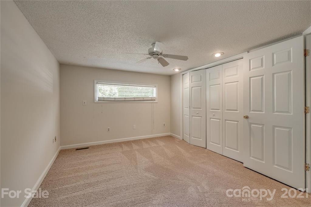 5349 Charlotte Highway Lake Wylie, SC 29710 - Photo 19 of 35 a view of an empty room with a window