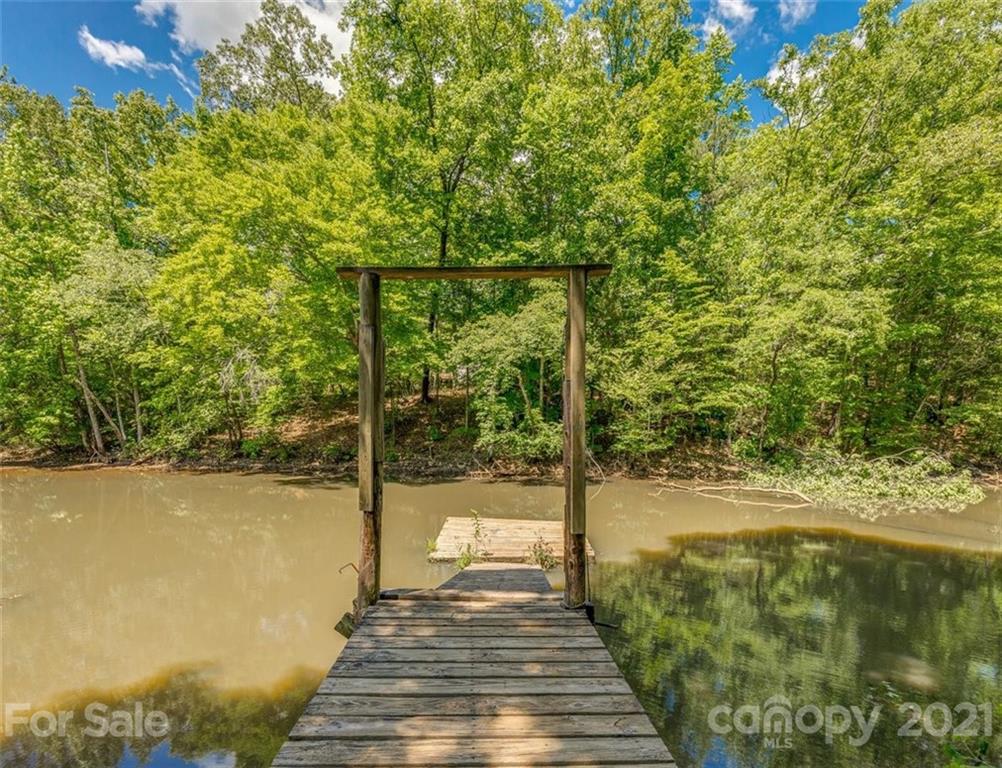 5349 Charlotte Highway Lake Wylie, SC 29710 - Photo 29 of 35 a view of a lake with a outdoor space