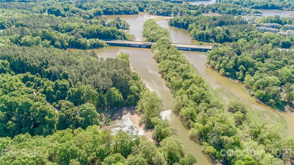 5349 Charlotte Highway Lake Wylie, SC 29710 - Photo 32 of 35 an aerial view of residential houses with outdoor space and lake view