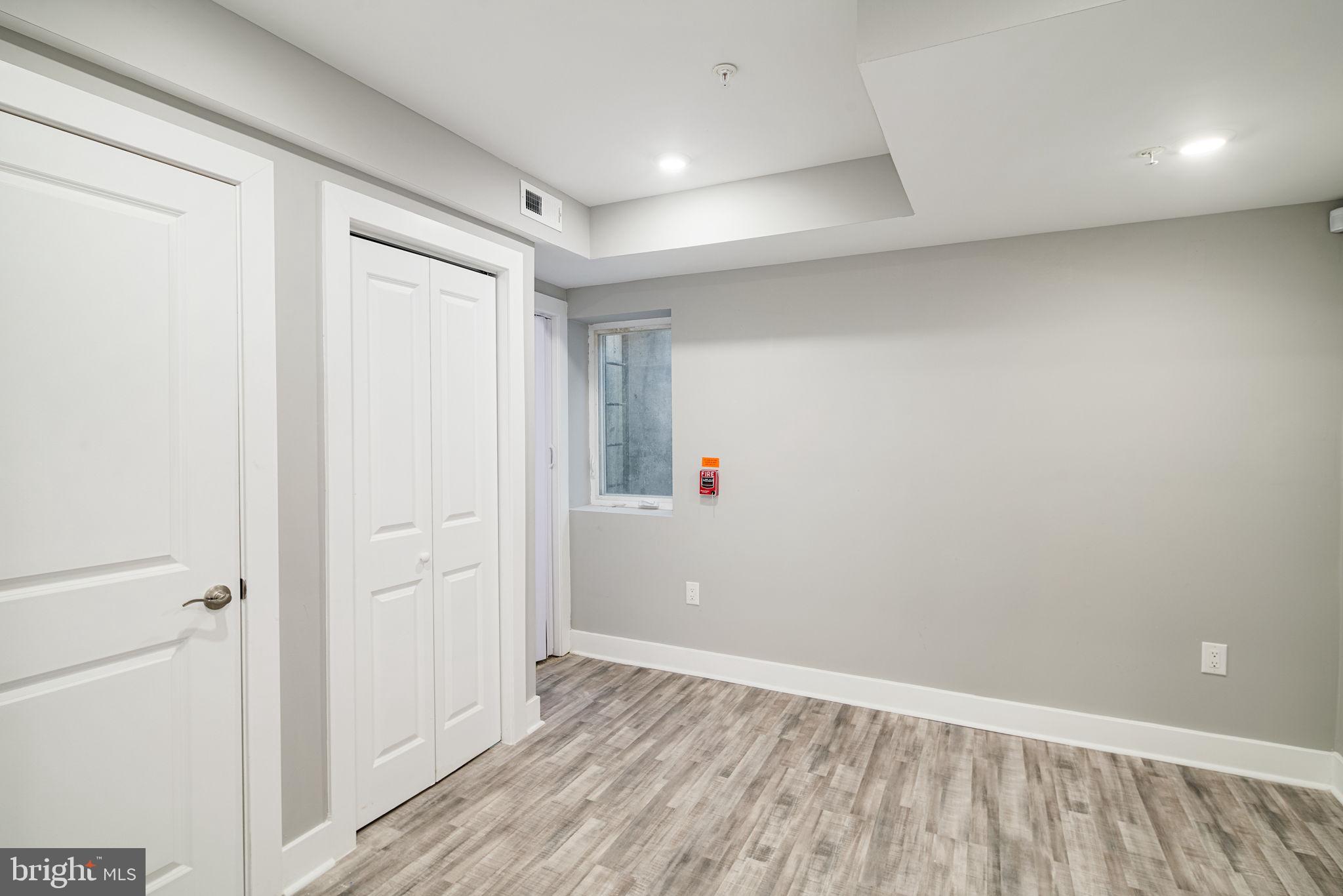1443 North 8th Street, Unit 2 Philadelphia, PA 19122 - Photo 11 of 18 a view of hallway with wooden floor