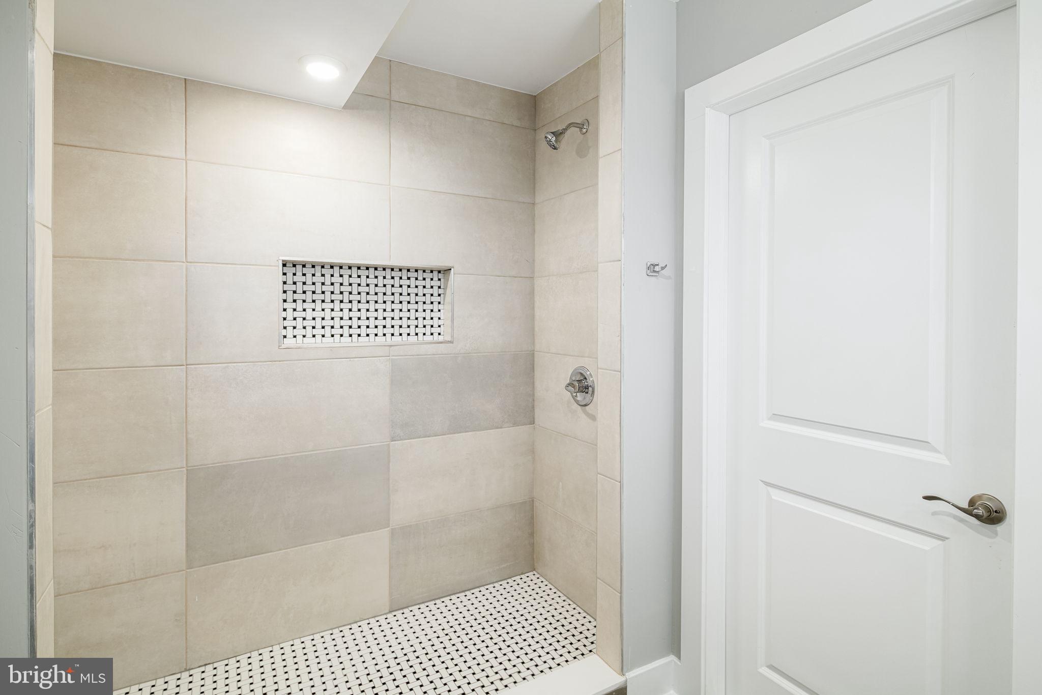 1443 North 8th Street, Unit 2 Philadelphia, PA 19122 - Photo 13 of 18 a bathroom with a shower