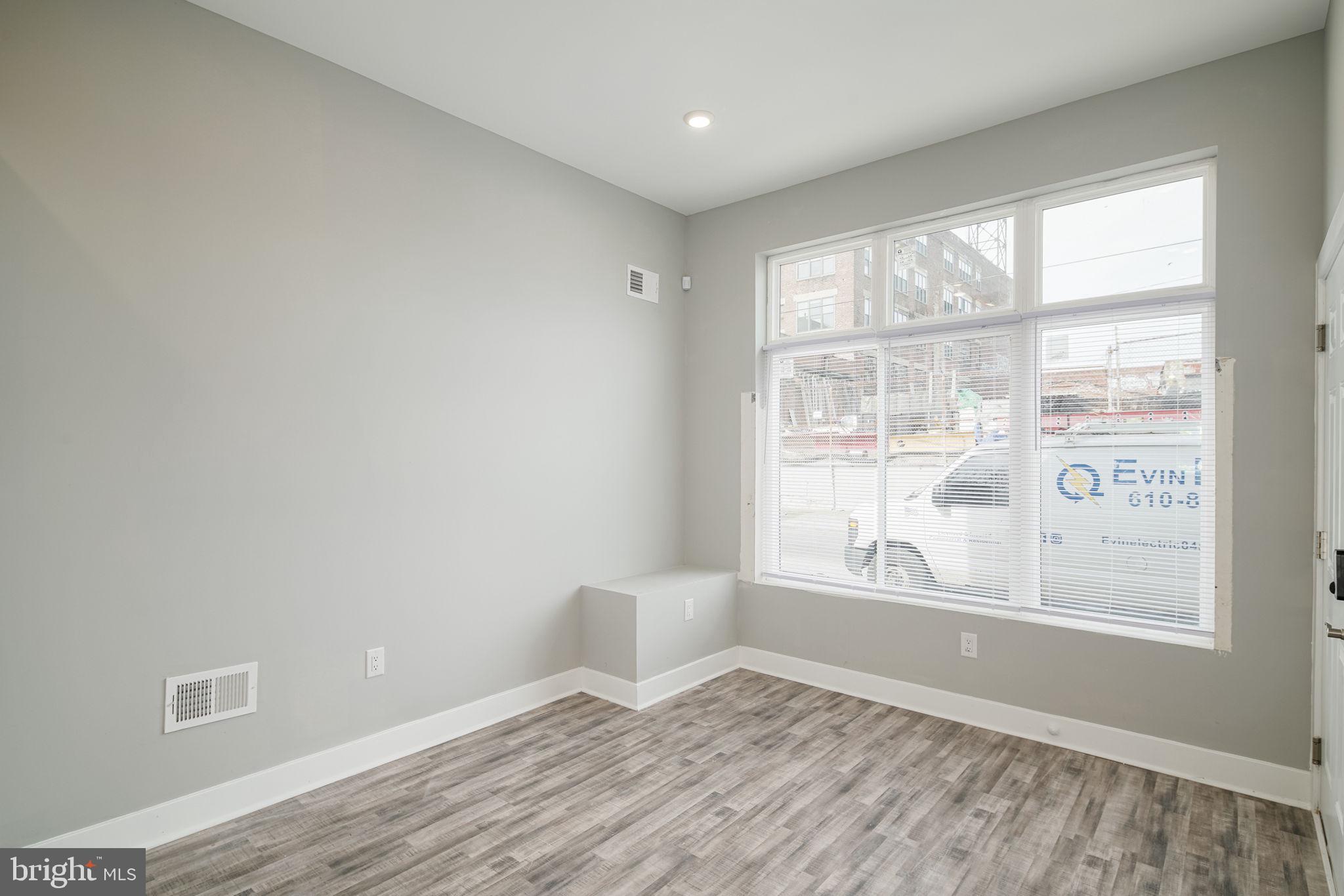1443 North 8th Street, Unit 2 Philadelphia, PA 19122 - Photo 6 of 18 a view of an empty room with a window