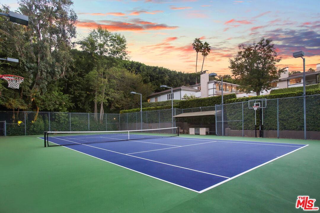 661 Doheny Road Beverly Hills, CA 90210 - Photo 26 of 28 a view of a tennis court