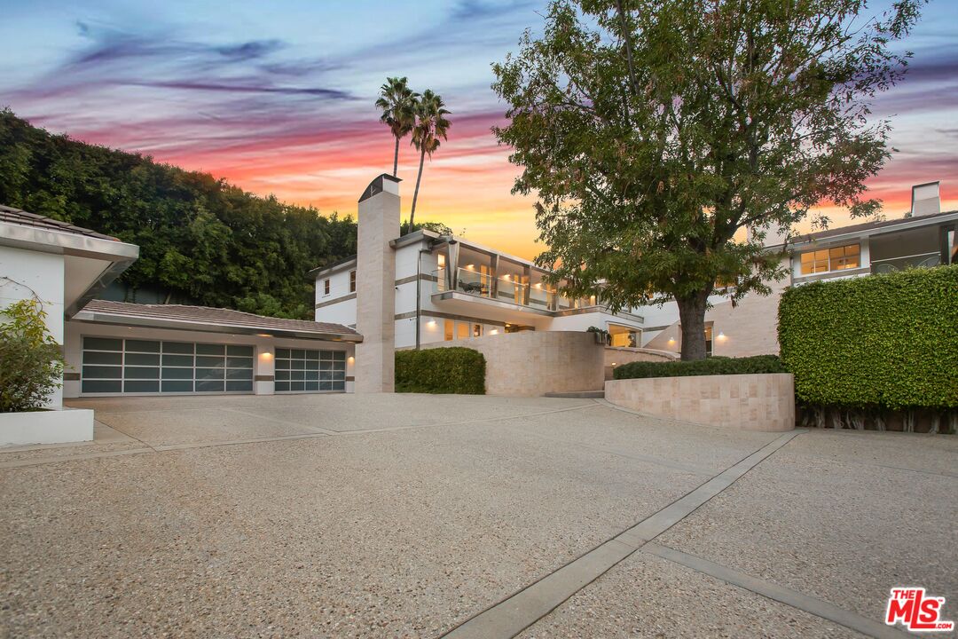 661 Doheny Road Beverly Hills, CA 90210 - Photo 29 of 33 a house view with a garden space