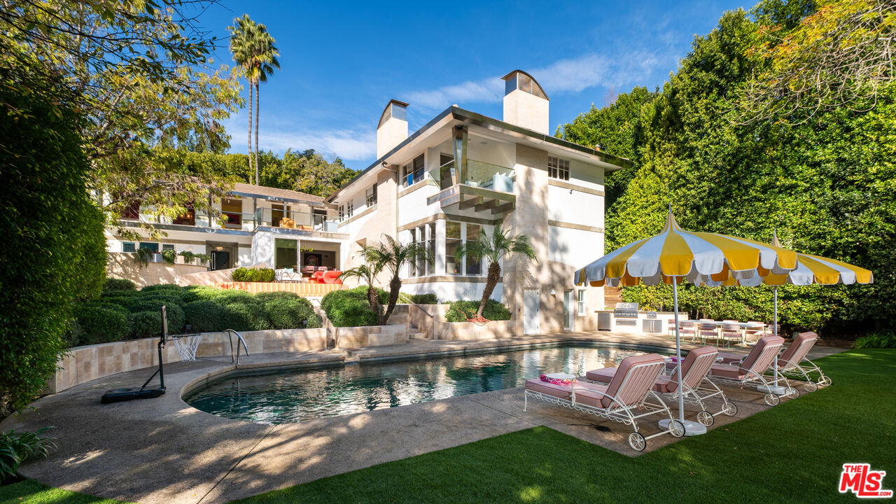 661 Doheny Road Beverly Hills, CA 90210 - Photo 32 of 33 a view of a house with a yard