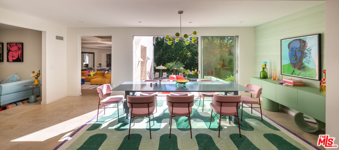 661 Doheny Road Beverly Hills, CA 90210 - Photo 7 of 33 a outdoor dining space with furniture and outdoor view