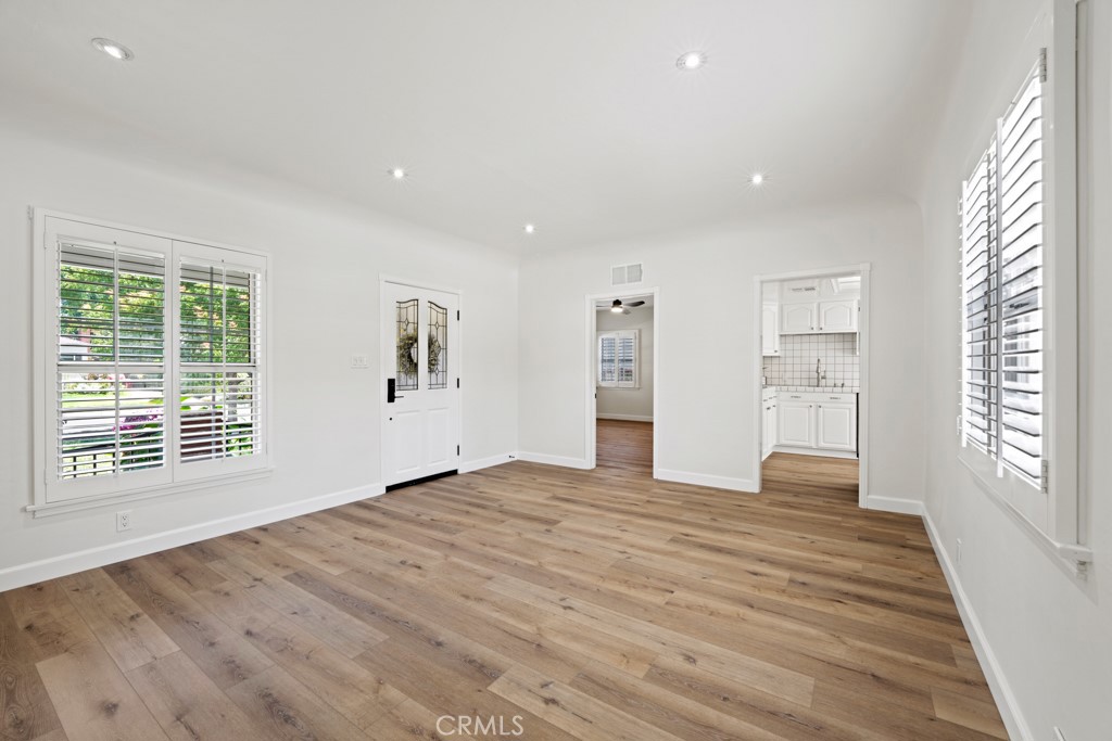 731 North Beachwood Drive Burbank, CA 91506 - Photo 15 of 53 a view of empty room with wooden floor and fan