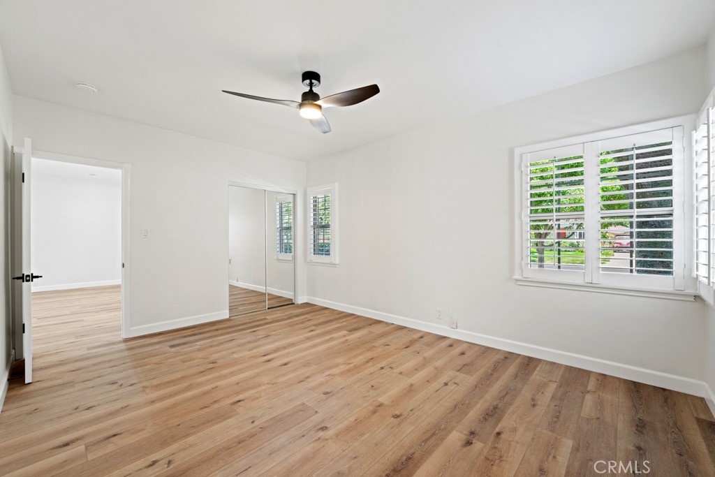 731 North Beachwood Drive Burbank, CA 91506 - Photo 18 of 53 a view of empty room with wooden floor and fan