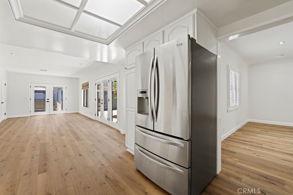 731 North Beachwood Drive Burbank, CA 91506 - Photo 24 of 53 a kitchen with stainless steel appliances a refrigerator and a stove