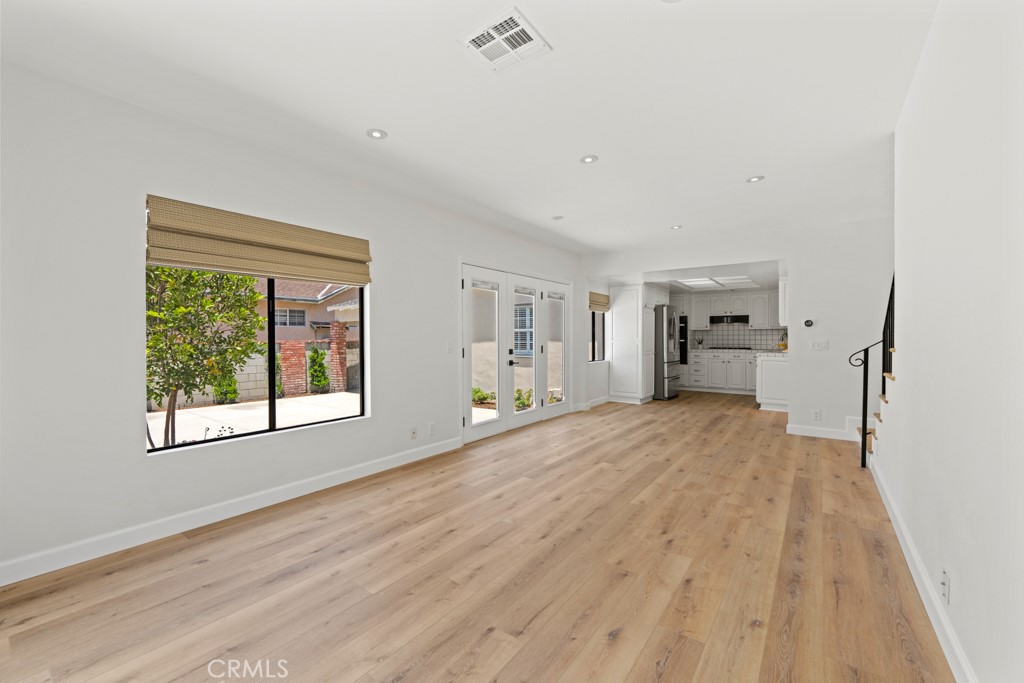 731 North Beachwood Drive Burbank, CA 91506 - Photo 28 of 53 a view of empty room with wooden floor and fan