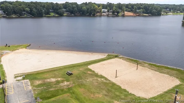 a view of a lake with a yard