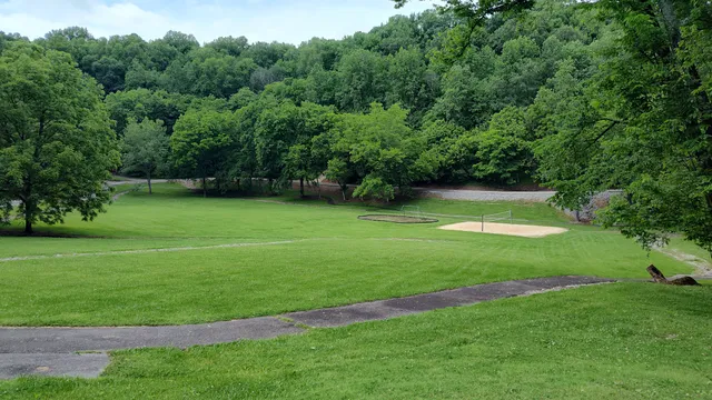 a view of a golf course with a park
