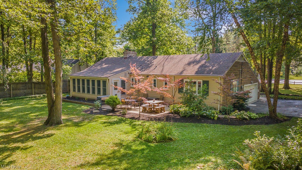 32261 Cedar Road Cleveland, OH 44124 - Photo 32 of 35 Rear view of house featuring a patio and a lawn