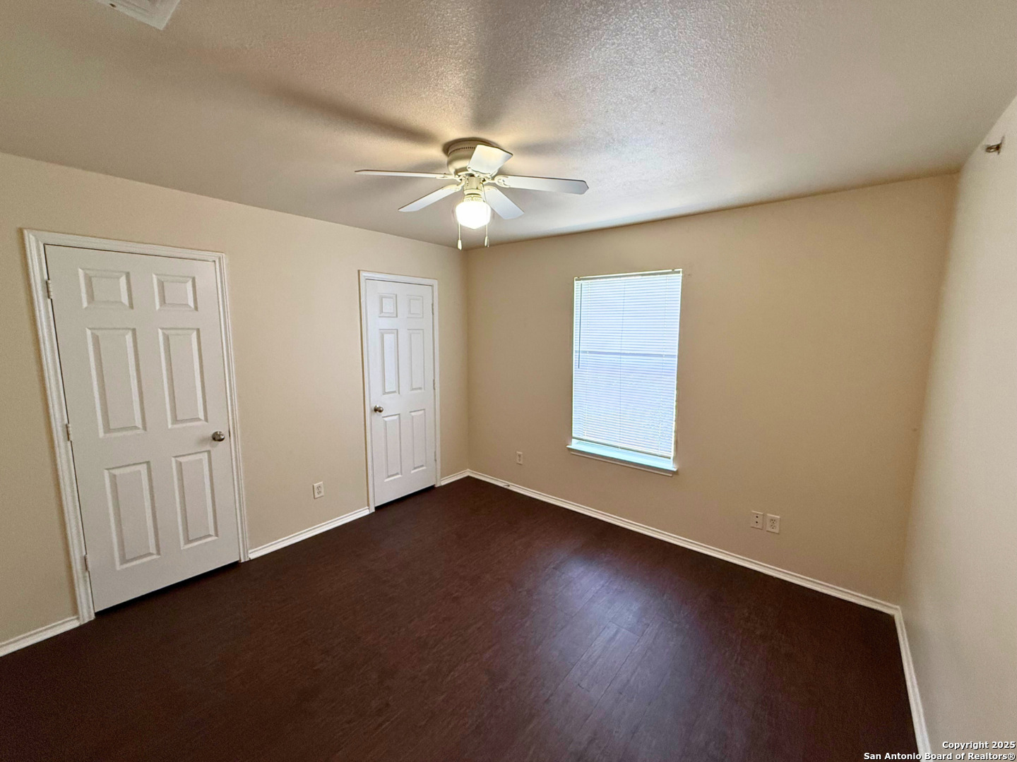 10822 Mathom Landing, Unit 3 Universal City, TX 78148 - Photo 12 of 14 a view of an empty room with a window