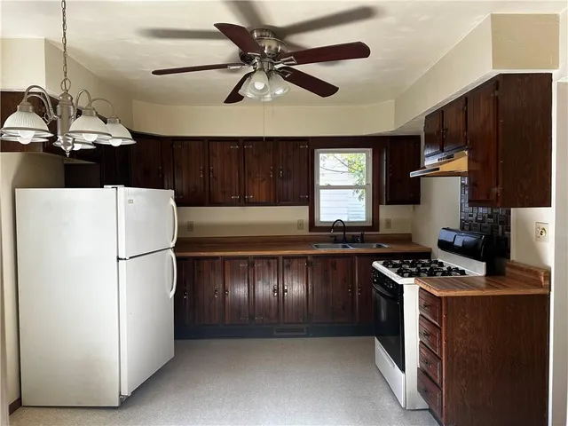 a view of kitchen and windows