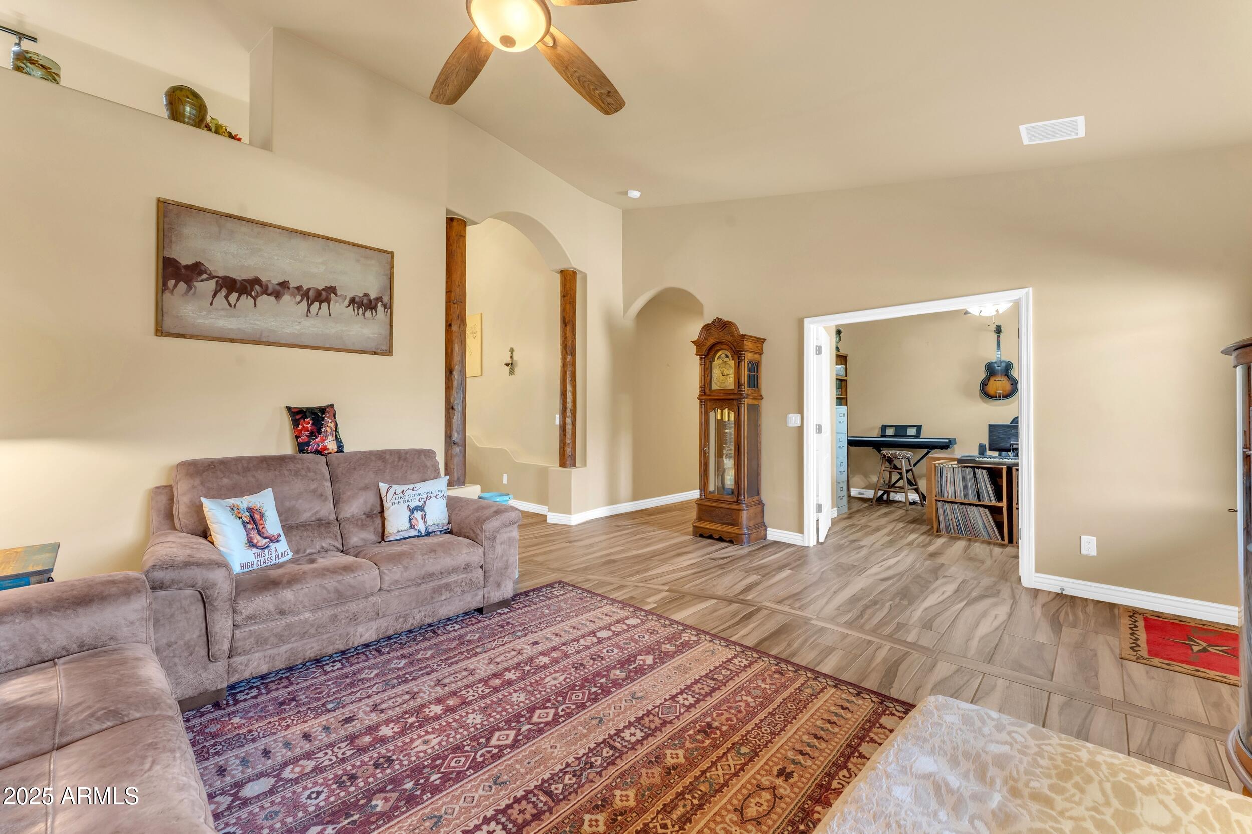 17707 East Stacey Road Queen Creek, AZ 85142 - Photo 13 of 89 a living room with furniture and a couch