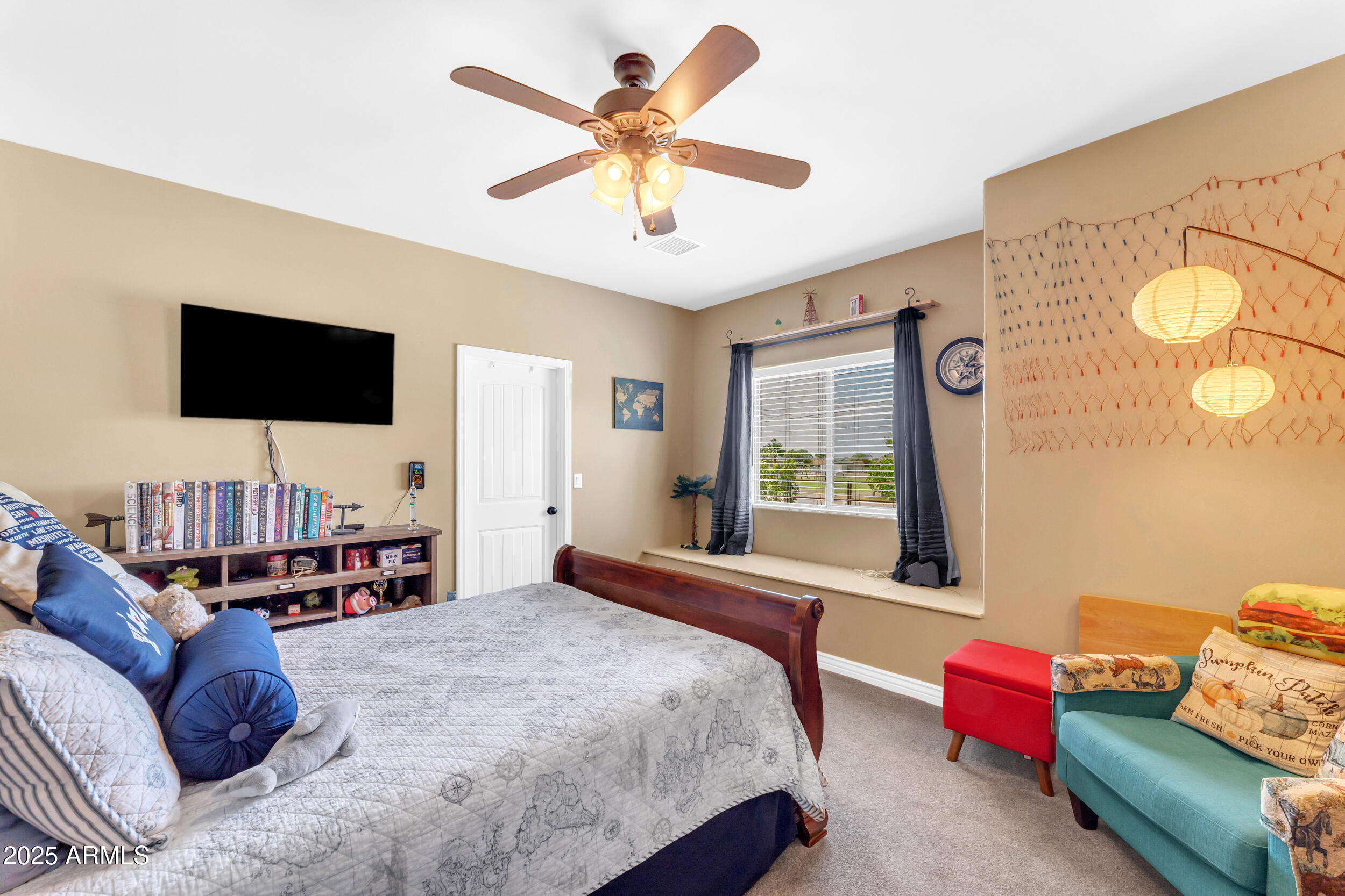 17707 East Stacey Road Queen Creek, AZ 85142 - Photo 47 of 89 a bedroom with a bed and a flat screen television