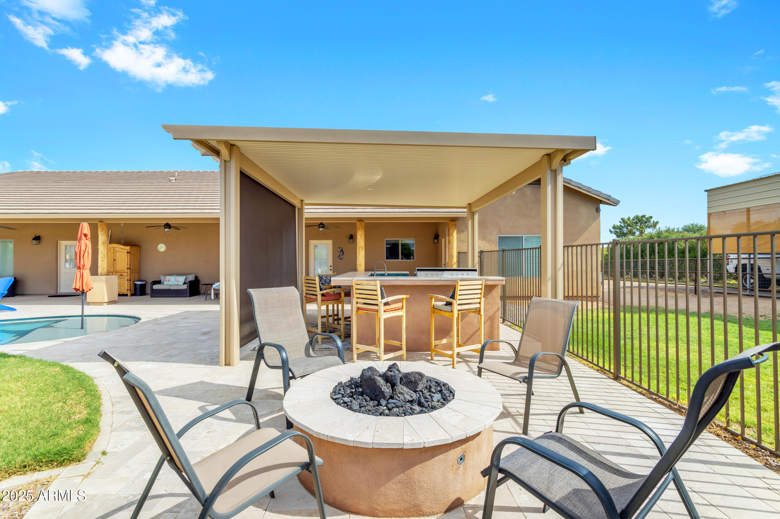 17707 East Stacey Road Queen Creek, AZ 85142 - Photo 57 of 89 a patio with a table and chairs