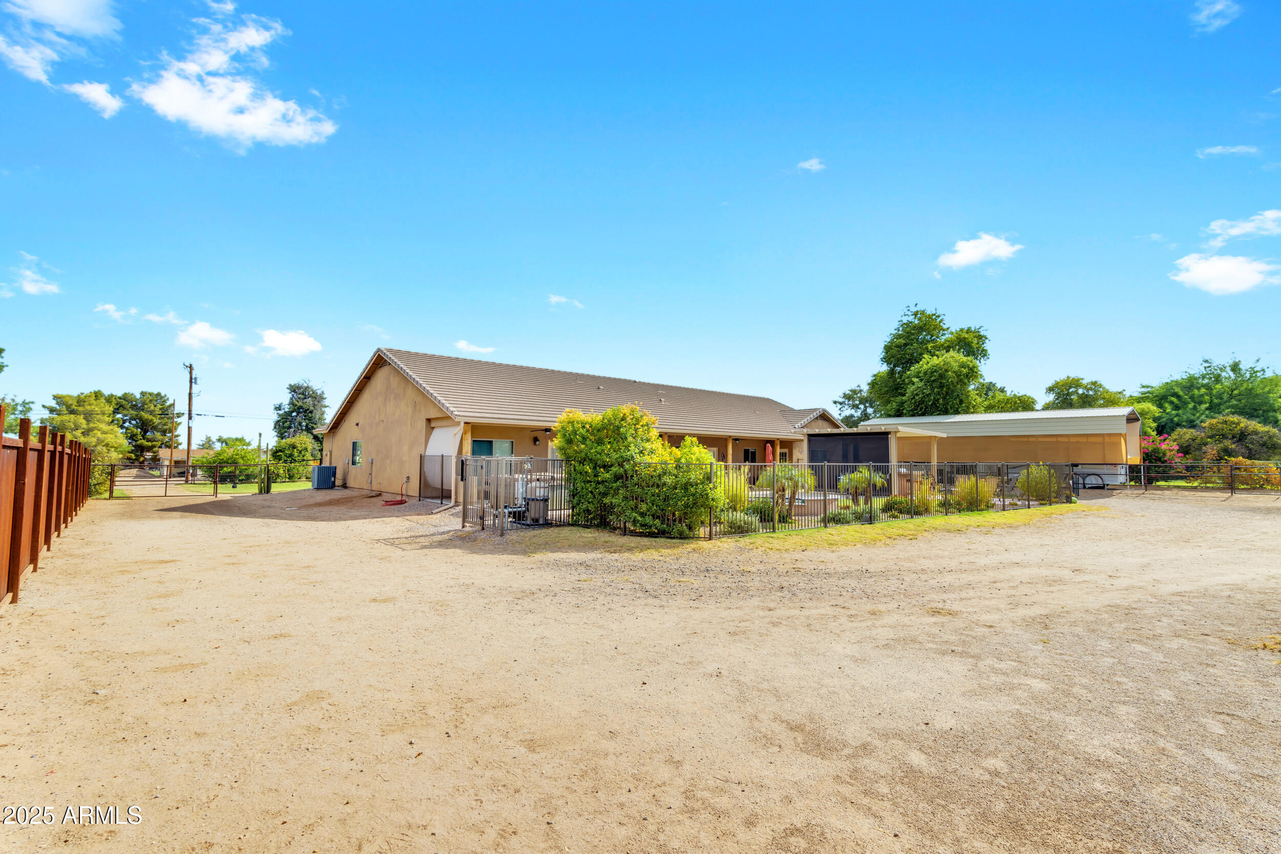 17707 East Stacey Road Queen Creek, AZ 85142 - Photo 65 of 89 a front view of a house with a yard and garage