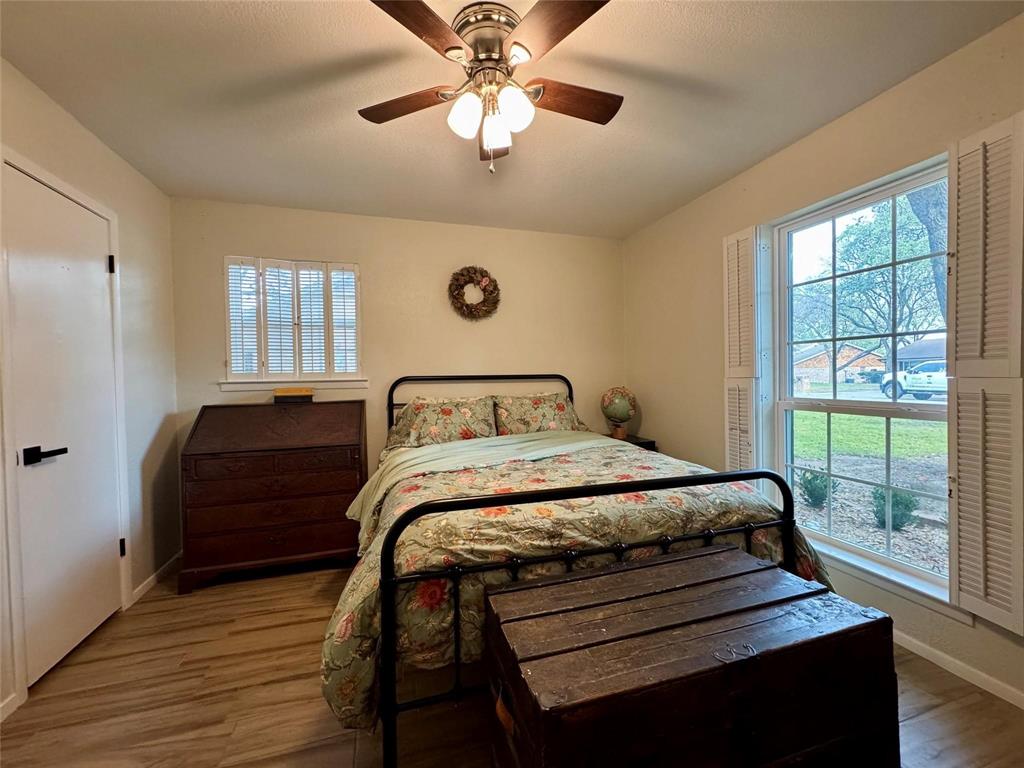 1116 Willow Creek Road Cleburne, TX 76033 - Photo 16 of 25 a bedroom with a bed and a window