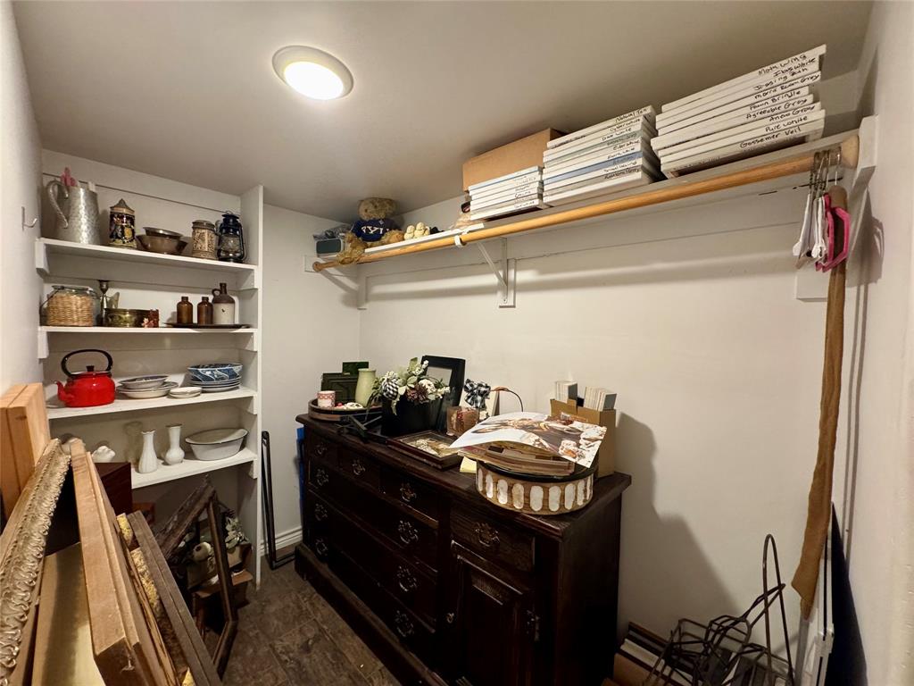 1116 Willow Creek Road Cleburne, TX 76033 - Photo 24 of 25 a room with storage and utility