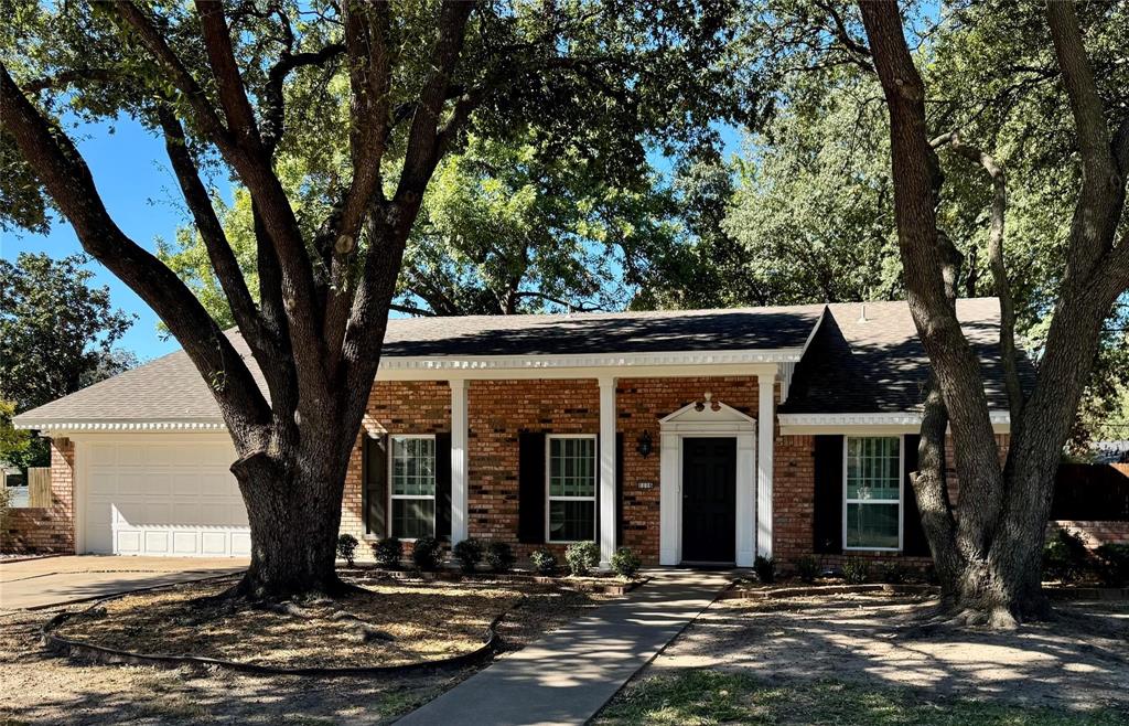 1116 Willow Creek Road Cleburne, TX 76033 - Photo 25 of 25 front view of a house with a tree
