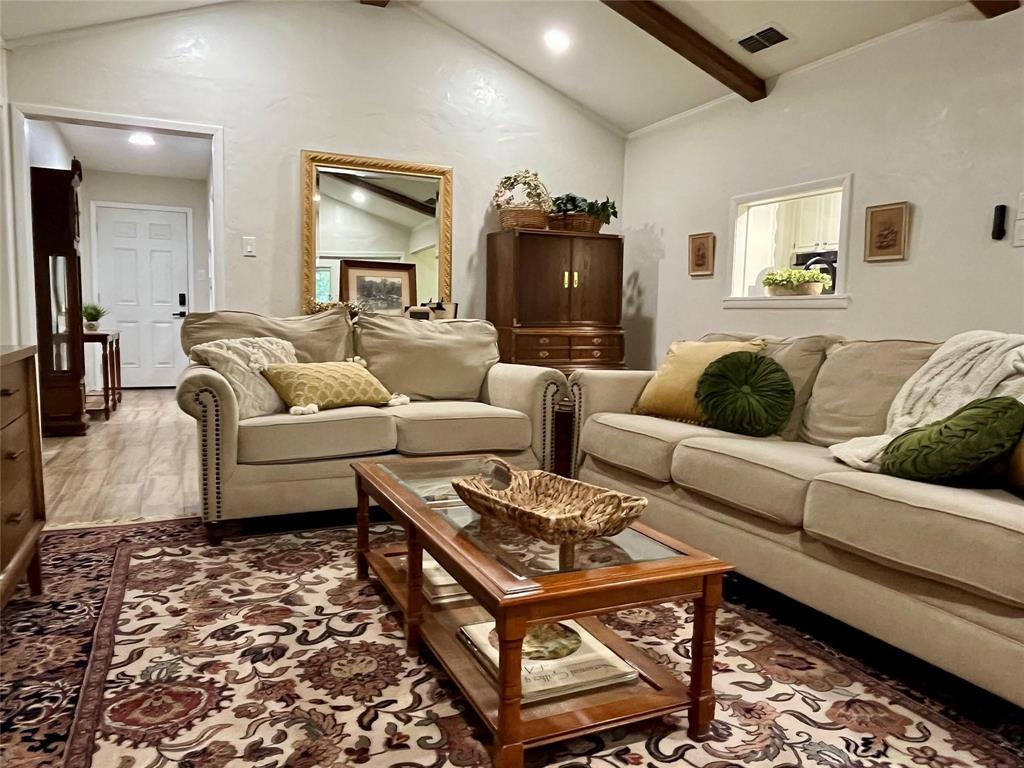 1116 Willow Creek Road Cleburne, TX 76033 - Photo 4 of 25 a living room with furniture and a rug