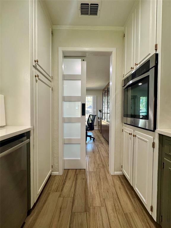 1116 Willow Creek Road Cleburne, TX 76033 - Photo 8 of 25 a view of a livingroom from a hallway