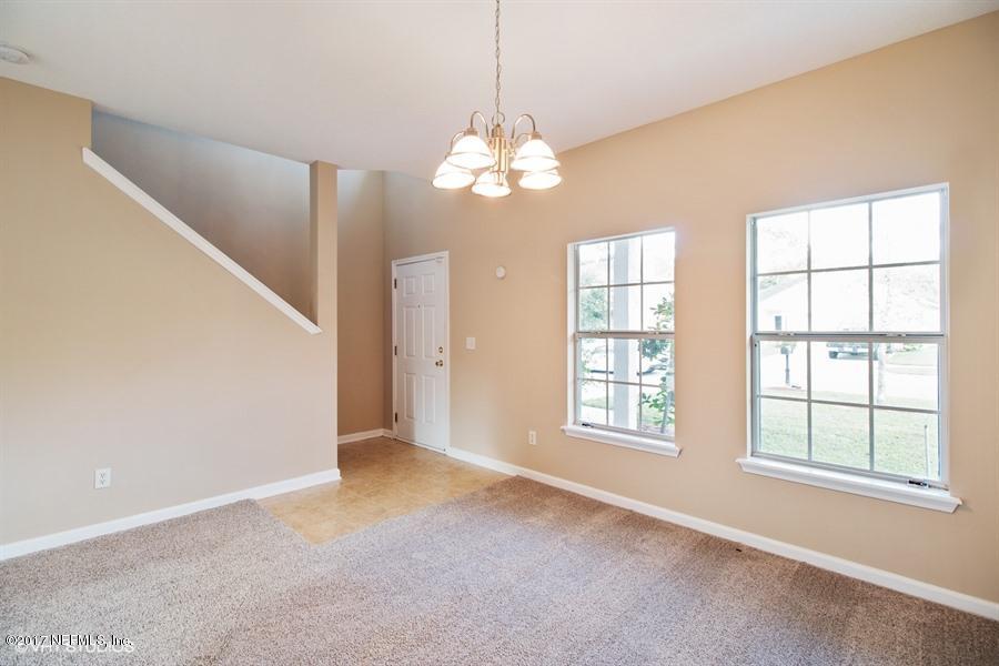 7225 Rampart Ridge Circle West Jacksonville, FL 32244 - Photo 4 of 15 a view of an empty room with a window