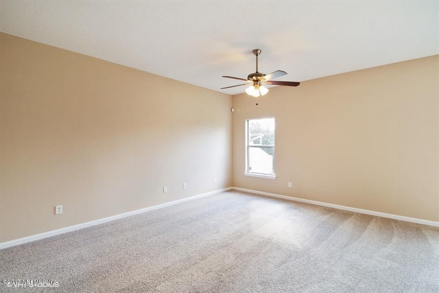 7225 Rampart Ridge Circle West Jacksonville, FL 32244 - Photo 6 of 15 a view of an empty room with a window