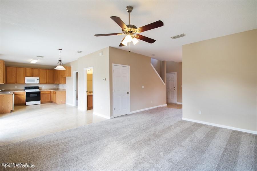 7225 Rampart Ridge Circle West Jacksonville, FL 32244 - Photo 7 of 15 a view of an empty room with a kitchen