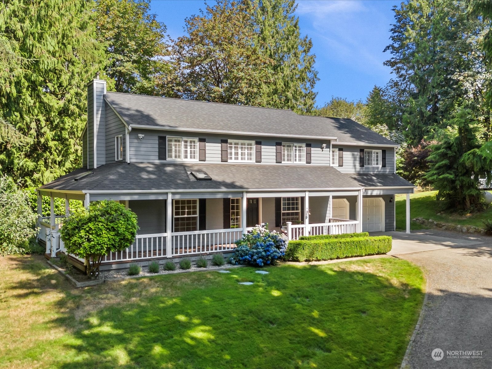 19911 Welch Road Snohomish, WA 98296 - Photo 1 of 40 front view of a house with a yard