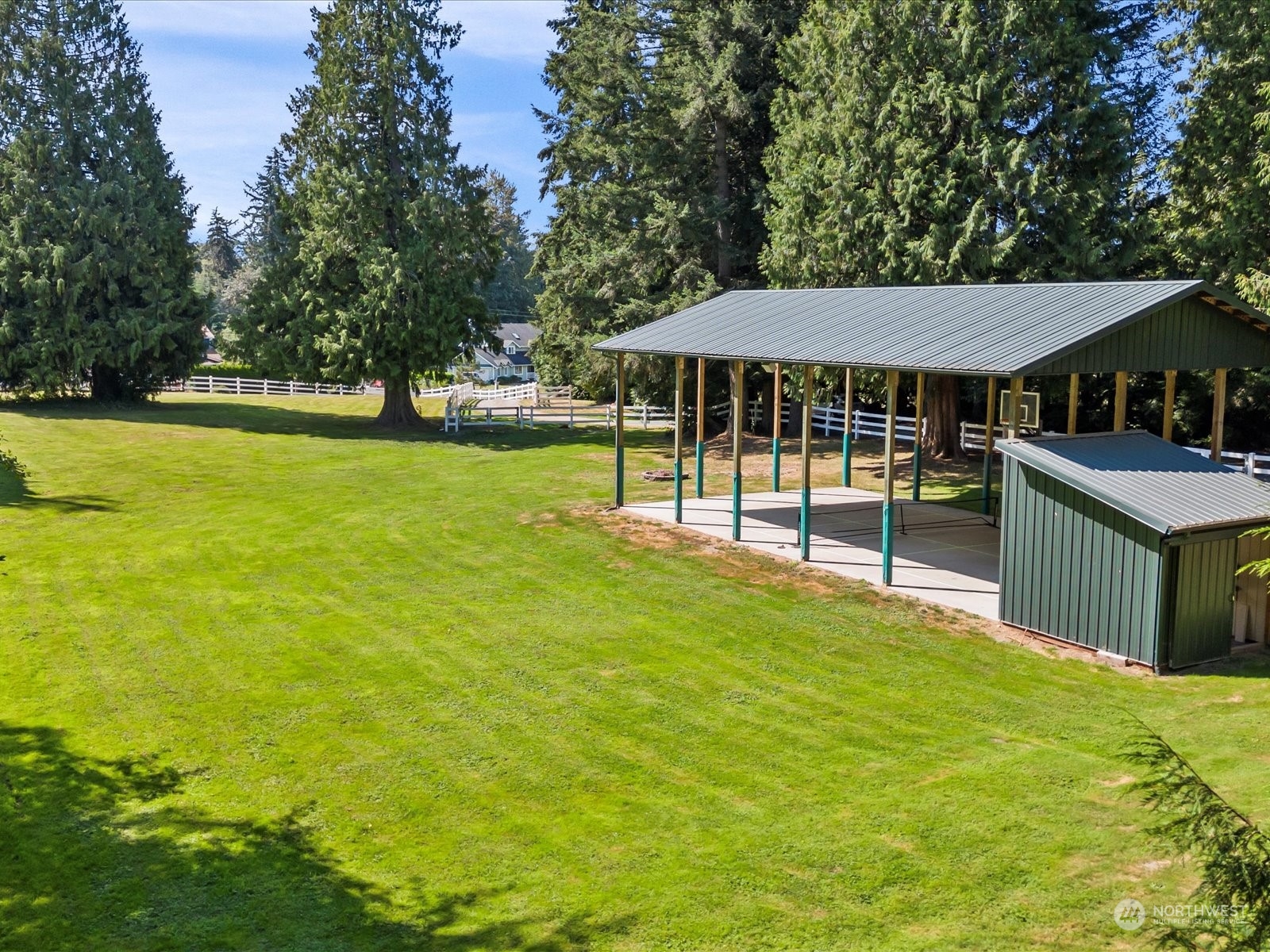 19911 Welch Road Snohomish, WA 98296 - Photo 15 of 40 a view of a swimming pool with a patio