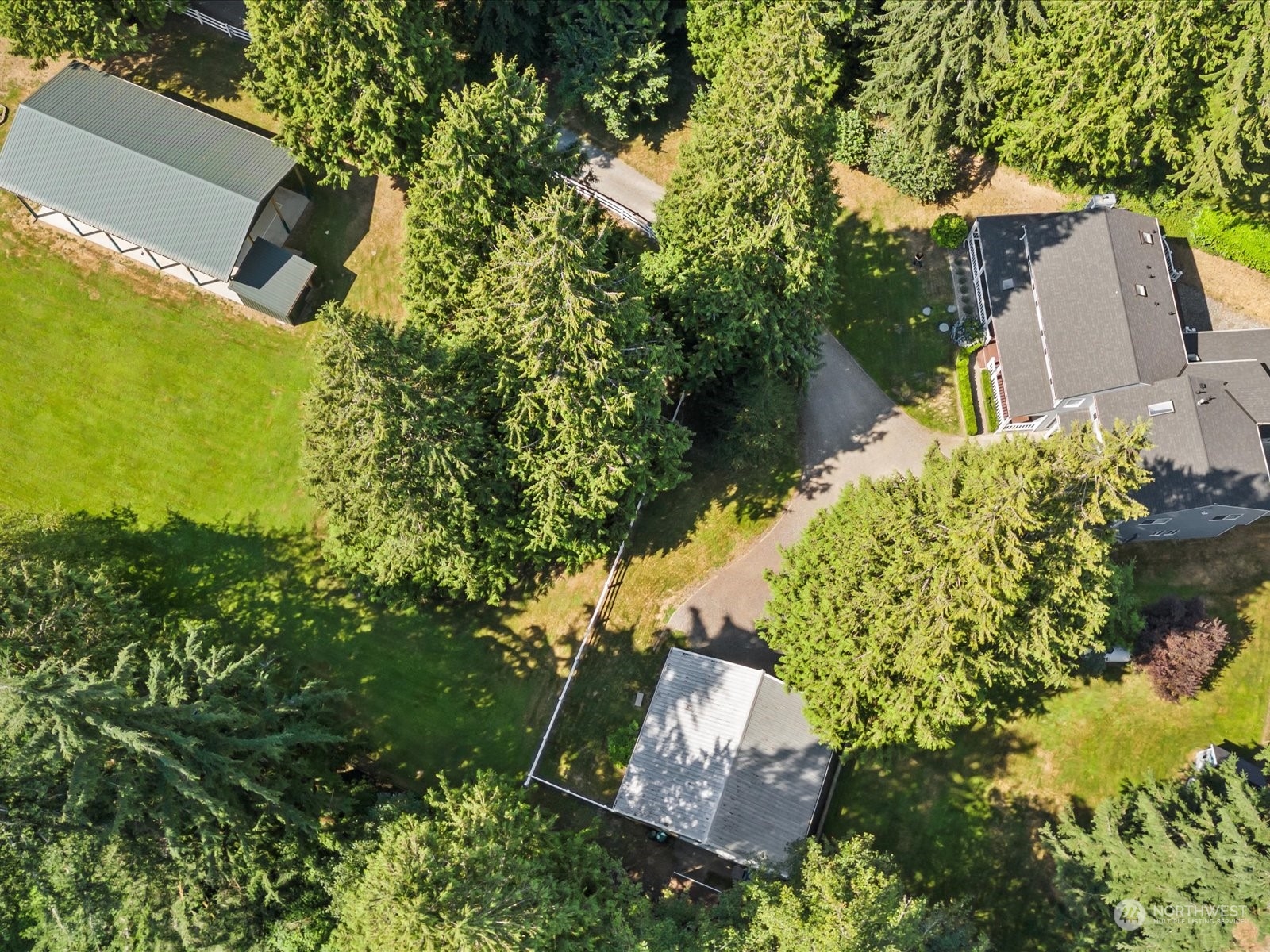 19911 Welch Road Snohomish, WA 98296 - Photo 16 of 40 an aerial view of a house with a yard