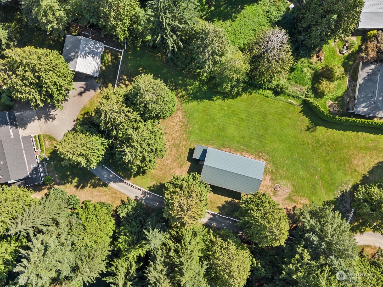 19911 Welch Road Snohomish, WA 98296 - Photo 17 of 40 an aerial view of a garden with houses