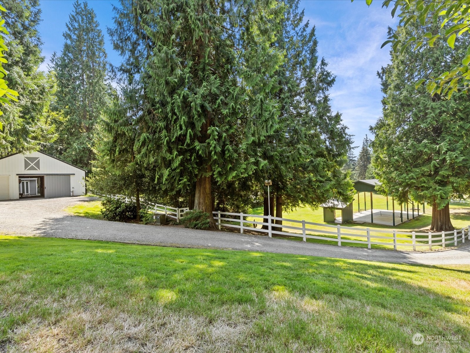 19911 Welch Road Snohomish, WA 98296 - Photo 30 of 40 a view of a playground with tree s