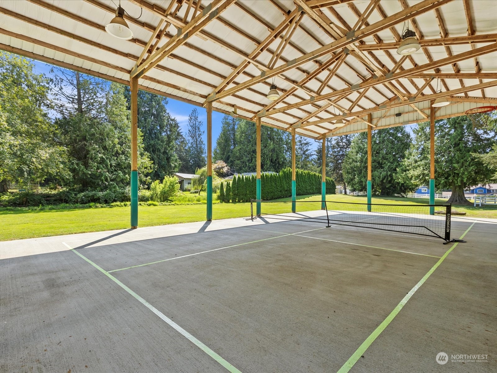 19911 Welch Road Snohomish, WA 98296 - Photo 36 of 40 a view of a swimming pool with a yard