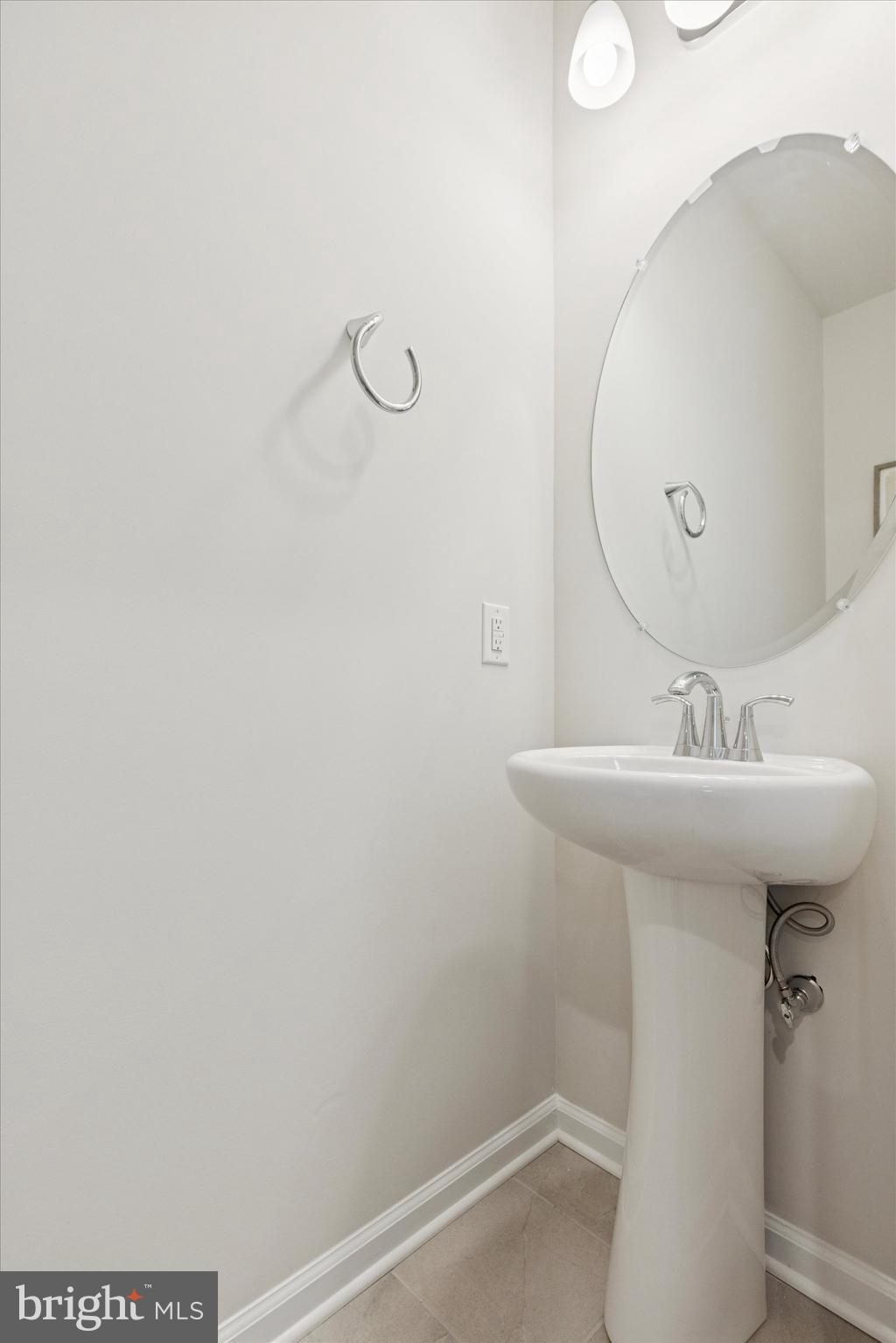 619 Liberty Ridge Road Horsham, PA 19044 - Photo 11 of 30 a bathroom with a sink a mirror and shower