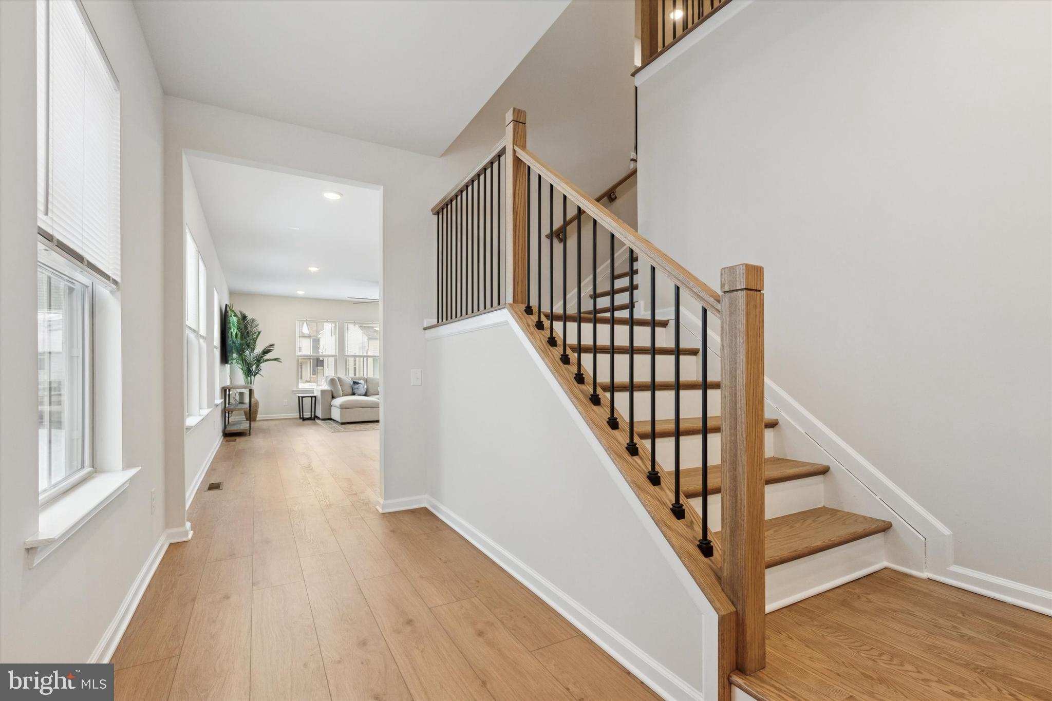 619 Liberty Ridge Road Horsham, PA 19044 - Photo 12 of 30 a view of a livingroom with wooden floor and stairs