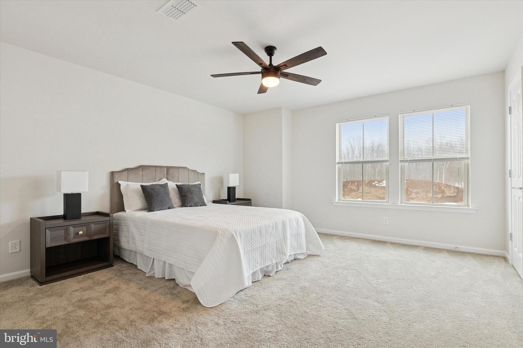 619 Liberty Ridge Road Horsham, PA 19044 - Photo 21 of 30 a spacious bedroom with a bed and a window