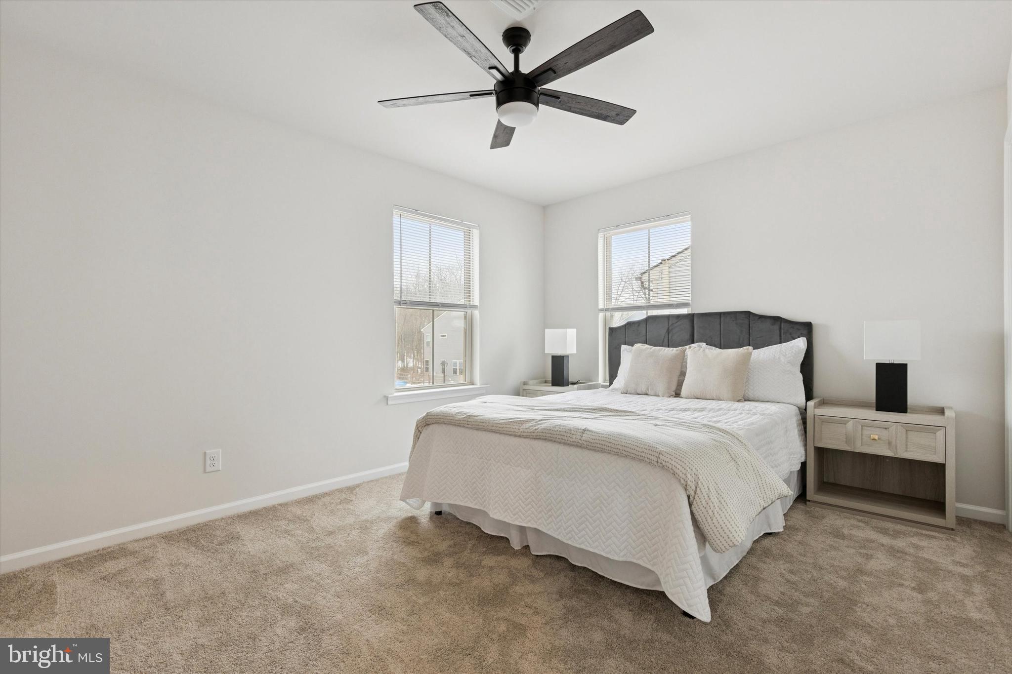 619 Liberty Ridge Road Horsham, PA 19044 - Photo 22 of 30 a bedroom with a bed and a ceiling fan