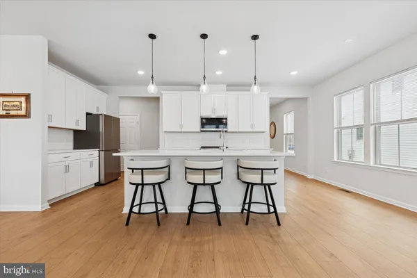 a view of kitchen with breakfast area
