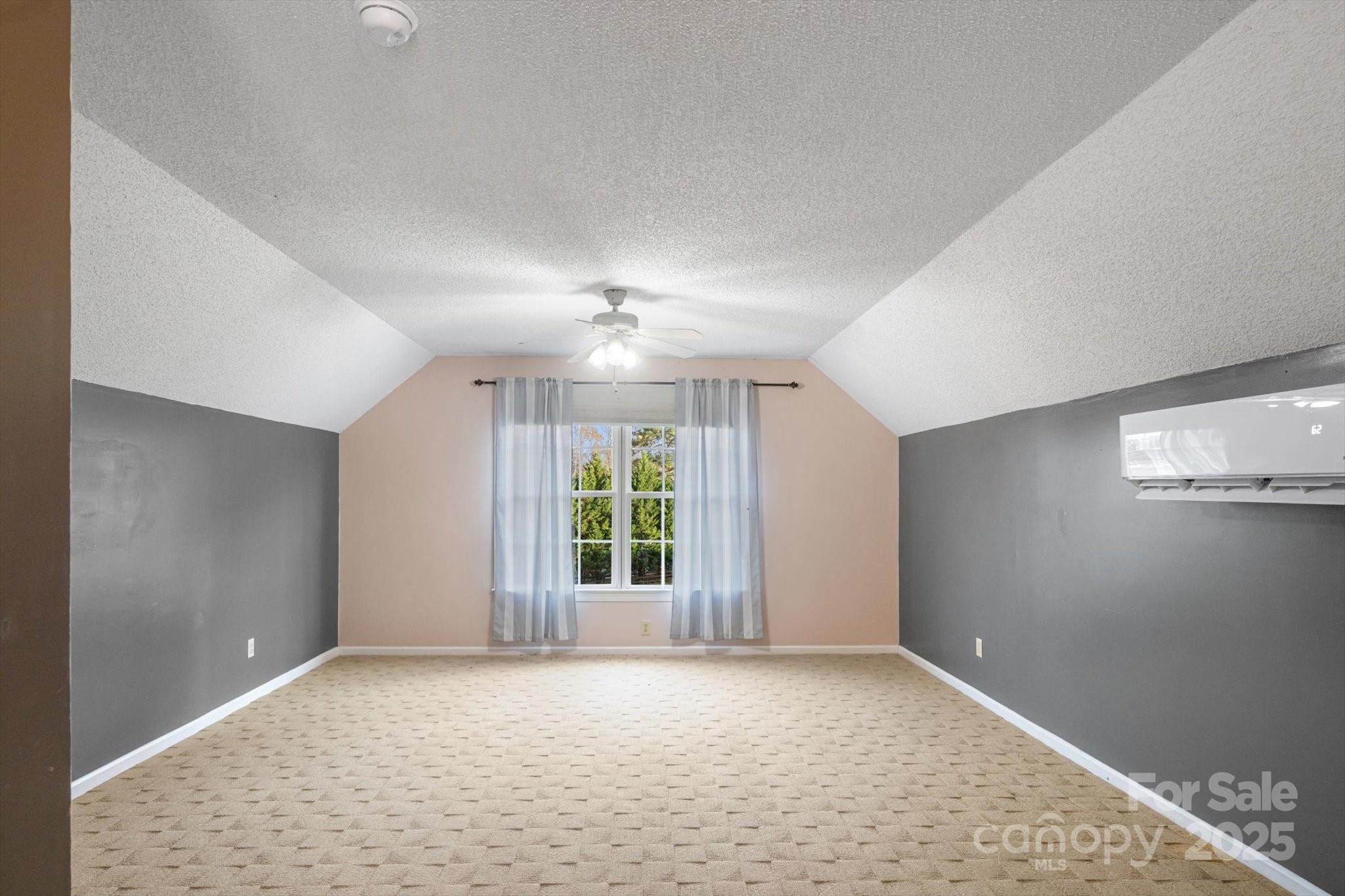 2409 Golf Course Road, Unit 14 Columbus, NC 28722 - Photo 24 of 25 a view of an empty room with a window