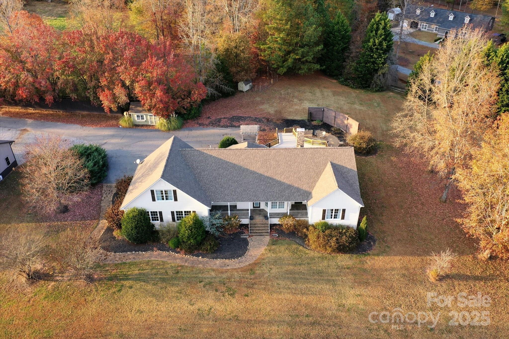 2409 Golf Course Road, Unit 14 Columbus, NC 28722 - Photo 7 of 25 a aerial view of a house with a yard and street view