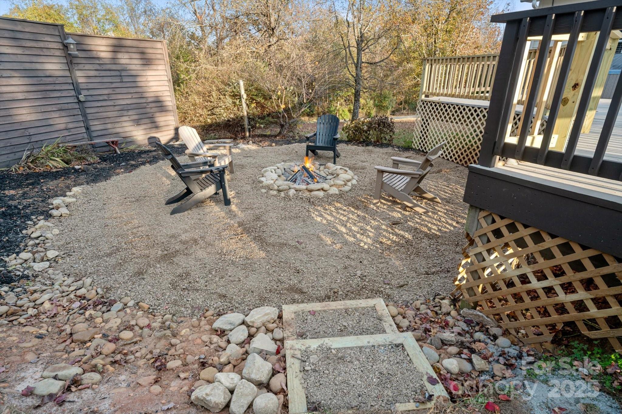 2409 Golf Course Road, Unit 14 Columbus, NC 28722 - Photo 9 of 25 a view of outdoor space with seating area