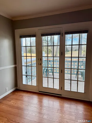 a view of a backyard with large trees