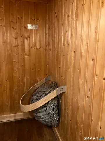 a bedroom with a bed and cabinets